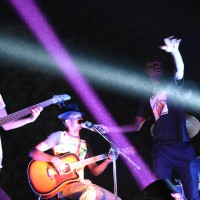 Croquemort performing with the Voice4Thought band at the open-air theatre Ballet National.