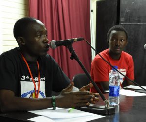 Slam artist Micromega explaining the technical aspects of a slam text.